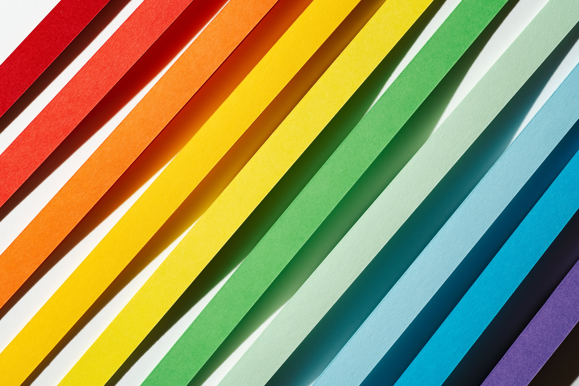 Rainbow colored paper stripe waves